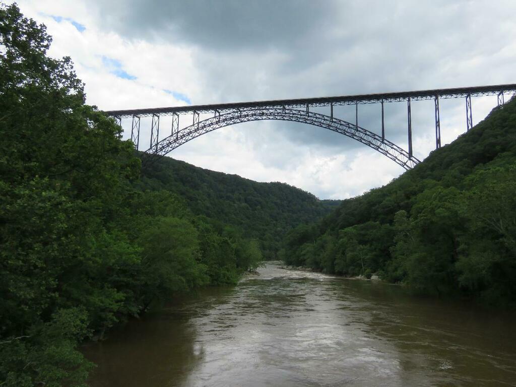 USA's Longest Steel Bridge Spans West Virginia's New River

Would you BASE jump, rappel or walk the 2-foot wide catwalk of West Virginia's New River Gorge #Bridge ? #WordyExplorers #AdventureTravel #NewRiverGorge #WestVirginia Are We There Yet? The Wordy Explorers postcards_…