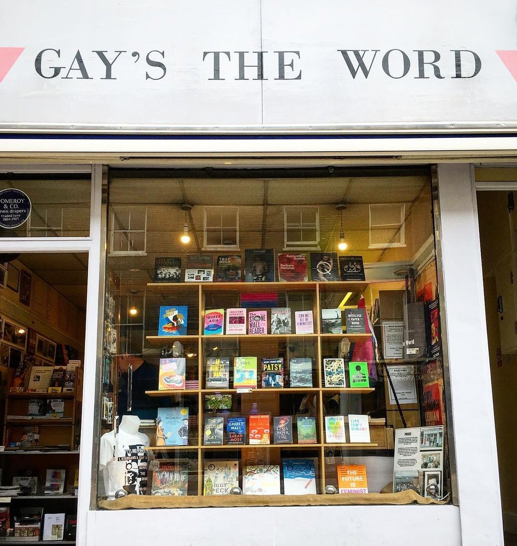 A photo of the "Gay's the Word" storefront showcasing books and the shop's sign.