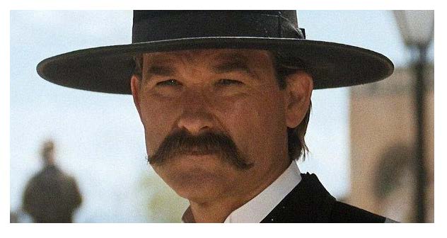 NARiverside's tweet image. We found what we believe to be a Kurt Russell look-alike in our Alien Registration Affidavits.  Tell us if you think Robert Kasper Koweske Blum resembles Kurt Russell as Wyatt Earp in “Tombstone.” #KurtRussell #Tombstone #ArchivesWaitWhat