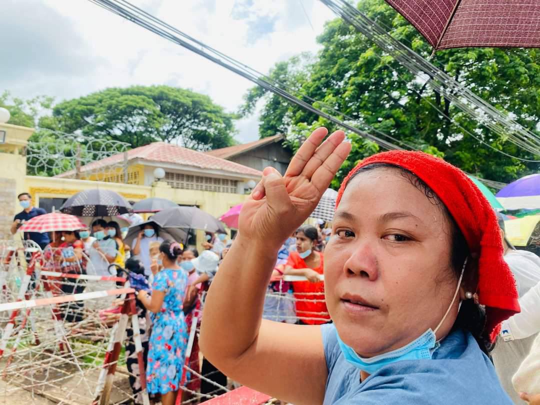 MM308890's tweet photo. Released Abductees &amp; their waiting family members still showing their spirit for Revolution with 3 fingers salute today. Though all of us had suffered brutalities of this Military Coup,nobody kneel down under SAC . 
#WhatsHappeningInMyanmar
#June30Coup https://t.co/sn1rjCL9Pk https://t.co/949ka3q8ir