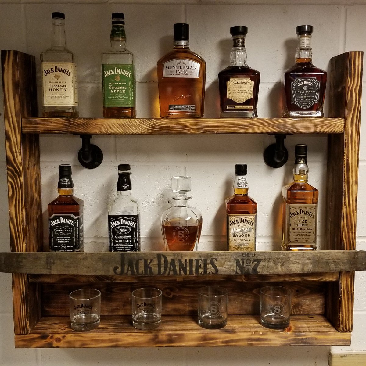 SchulTeacher's tweet photo. Enjoyed designing and building a display for my @JackDaniels_US whiskey. Celebrated with a glass of old No. 7.  #cheers #DrinkResponsibly #jackdanielswhiskey https://t.co/gA71mggPRY