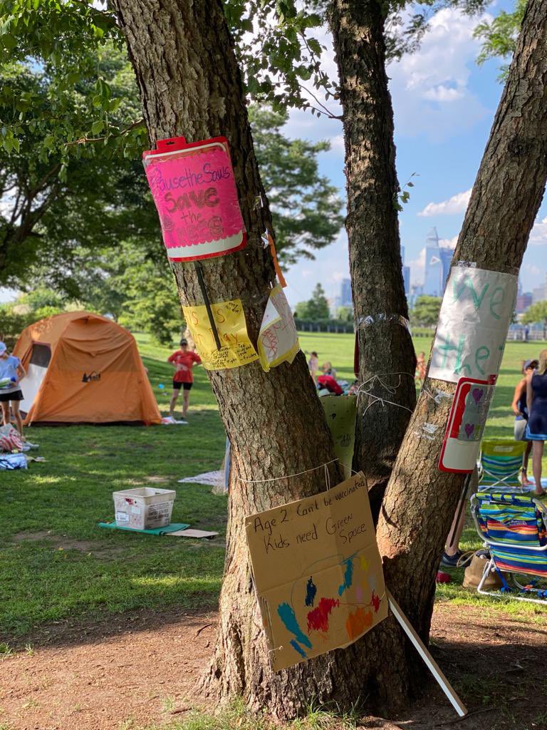 nycmomorg's tweet photo. Dear @NYGovCuomo, we have been camped out in the heat waiting for you to answer our calls to have a conversation about your plans to cut down our trees, pave over our grass &amp; reduce the grass space our kids use to play #pausethesaws @SenSchumer @BrianKavanaghNY @RepJerryNadler https://t.co/DmE9YyyyGV