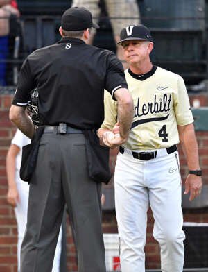 tim corbin Asking the umps for a round of covid testing for ms state in the 7th inning of the final game