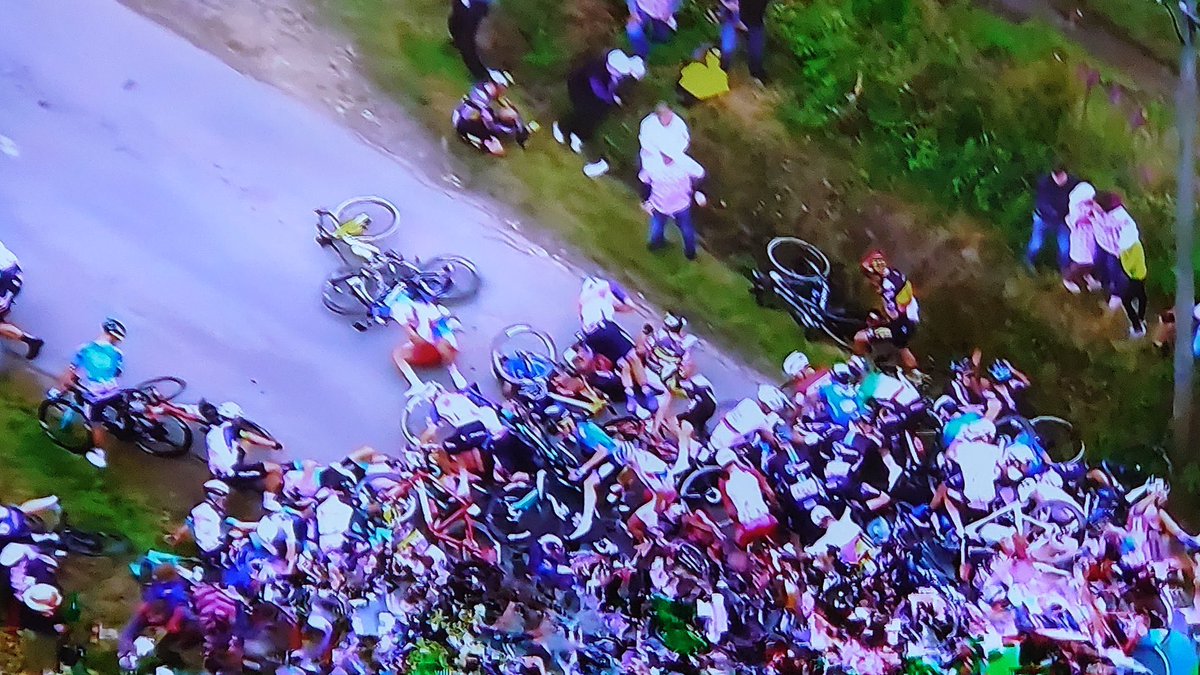 SYSCAbout's tweet photo. Police arrested the spectator who caused the massive Tour de France crash in the first stage, after she turned herself in. 

She is accused of involuntarily causing injury and putting the life of others at risk. https://t.co/gszcuFH6fo