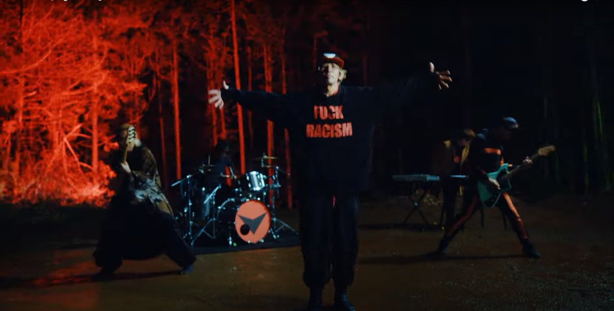 It's cool that in No More Heroes III they give Travis the 'FUCK RACISM' shirt from the Red Orca 'Night hawk' music video.