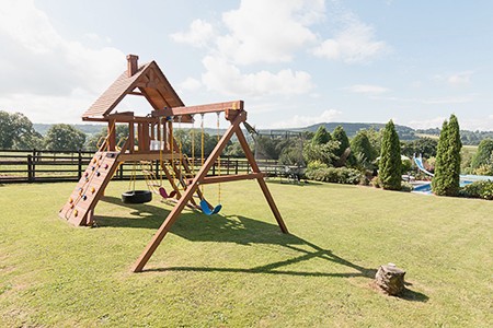 Time for play in the garden at Foxhill Lodge then pop down to the pool #garden #view #spacious #playarea #kids #familytime #luxuryfamilyholiday #devon #blackdownhills #countryair #pool #slide