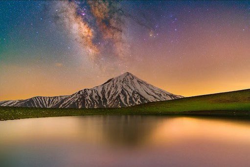 IranianPlateau's tweet photo. این عکس از مسعود قدیری، عکاس نجومی ایرانی، به عنوان یکی از برگزیدگان مسابقه عکاس نجوم سال ۲۰۲۱ که رصدخانه سلطنتی گرینویچ برگزار می‌کند، انتخاب شده است. ‌‌در این عکس کهکشان راه شیری و صورت فلکی عقرب در سمت راست آلودگی نوری تهران دیده می‌شود که انعکاسش در آب پدیدار شده است.‌ https://t.co/Km7XRSviuK