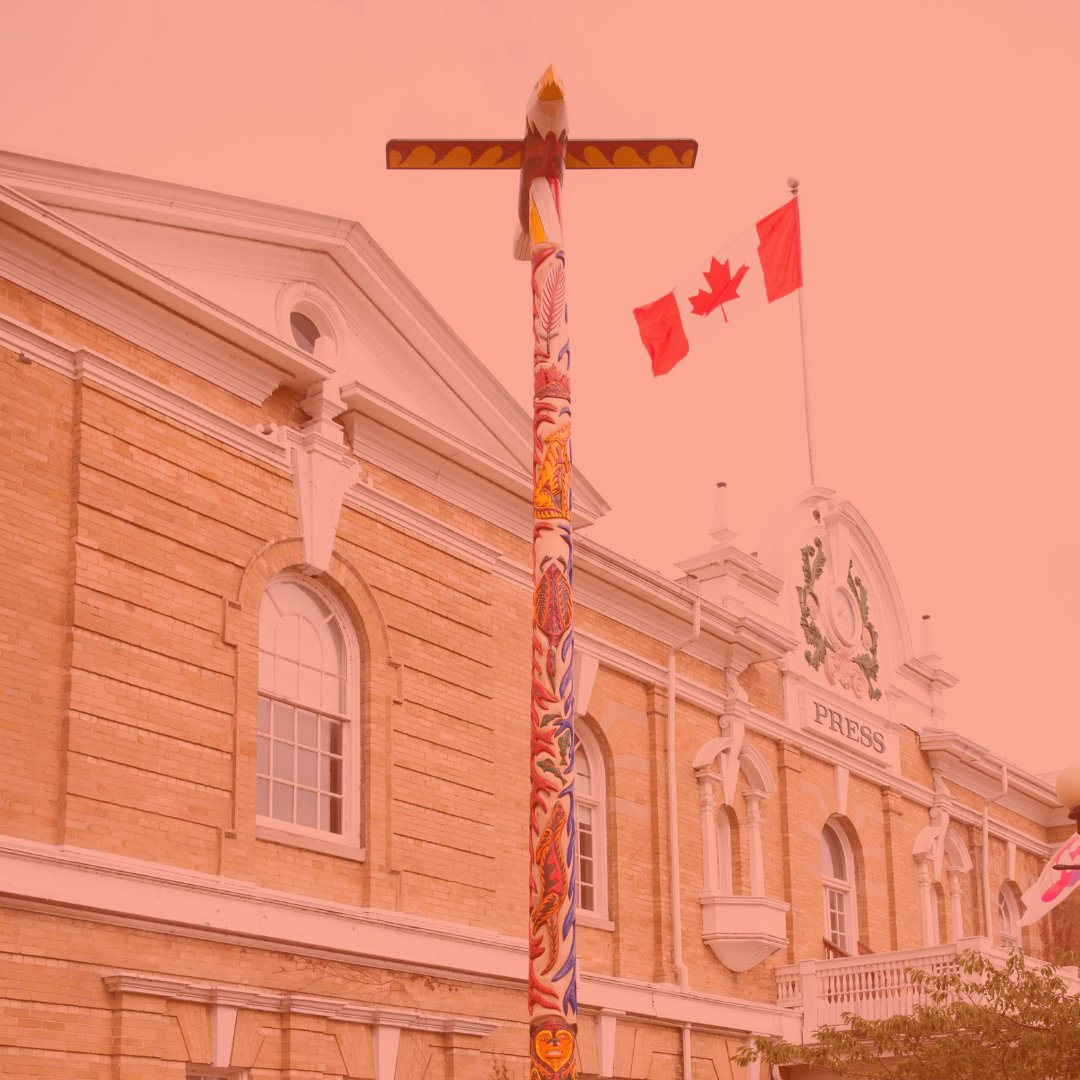 CNE Press Building with Unity Pole in front of it. 