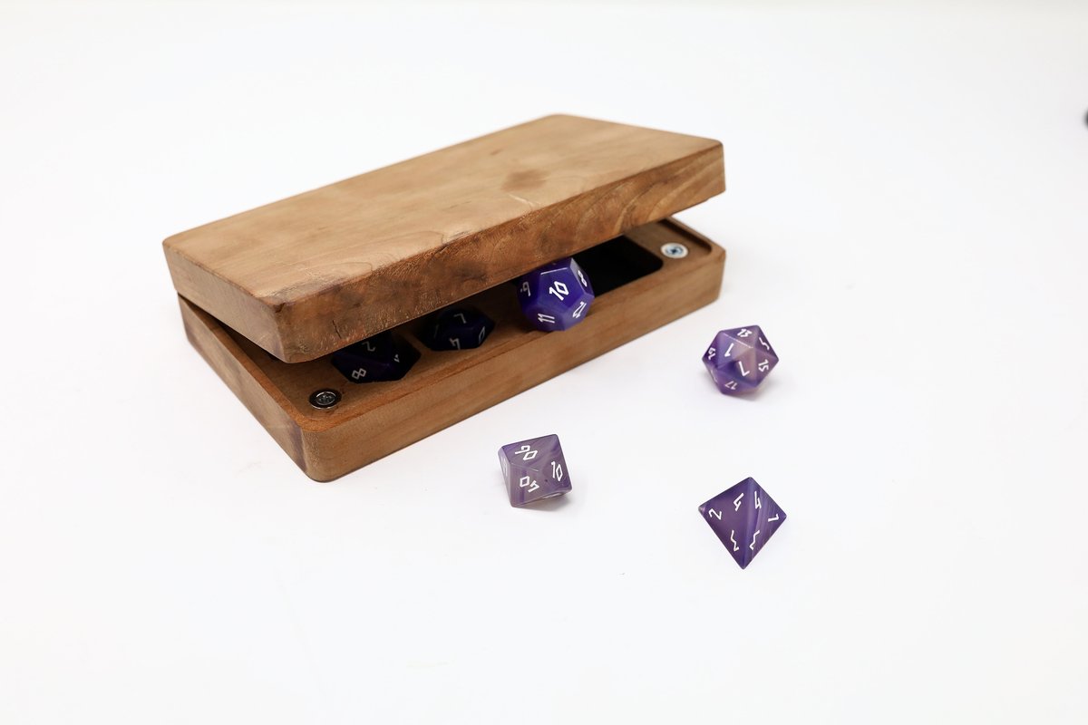 Trying to figure out a name for this guy. Holds a full set of diced and a mini, with a small roll area.
.
#tabletopgame #geek #gaming #gloomhaven #dnd #minis #dice #dnd5e #pathfinder #boardgame #goblinhive #tabletoptravelingtray #ttrpg #tabletop #rpg #norsefoundry <a href="/norsefoundry/">Norse Foundry</a>