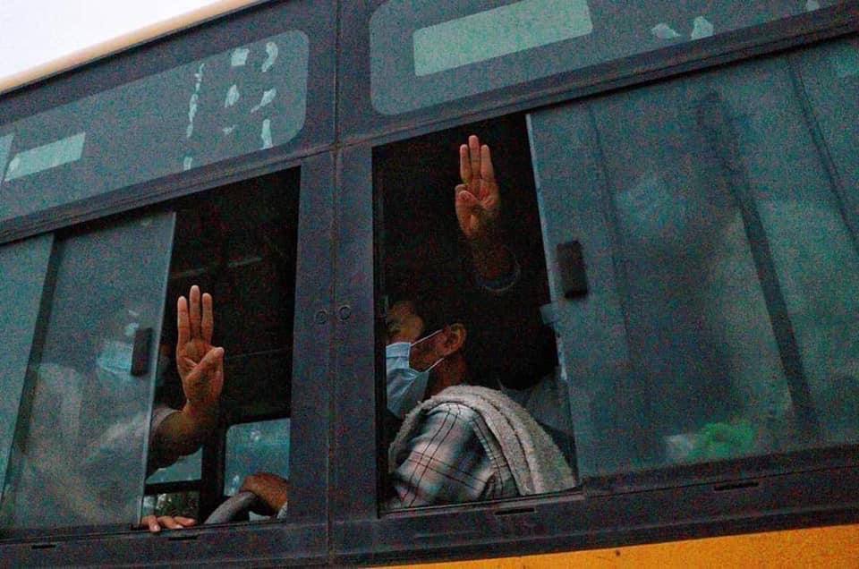MM308890's tweet photo. Released Abductees &amp; their waiting family members still showing their spirit for Revolution with 3 fingers salute today. Though all of us had suffered brutalities of this Military Coup,nobody kneel down under SAC . 
#WhatsHappeningInMyanmar
#June30Coup https://t.co/sn1rjCL9Pk https://t.co/949ka3q8ir