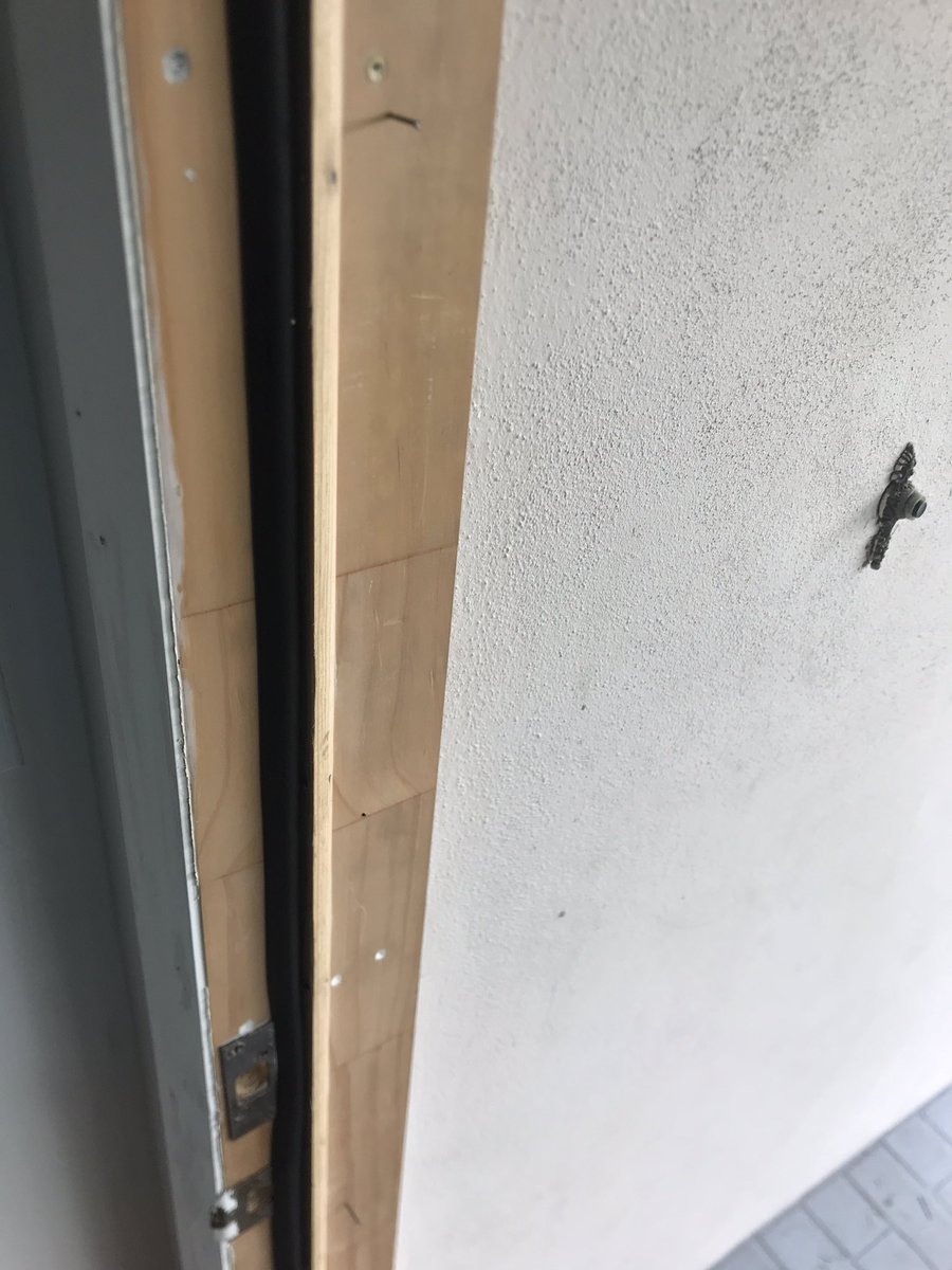 tdowdell2's tweet photo. They came back the next day, apologized and just tacked a thin piece of wood on with the old nails still in the frame. It didn’t look consistent with the rest of the door so I asked them to fix it. Four days later they came back and added a scrap piece on. https://t.co/qk79X5wNNb
