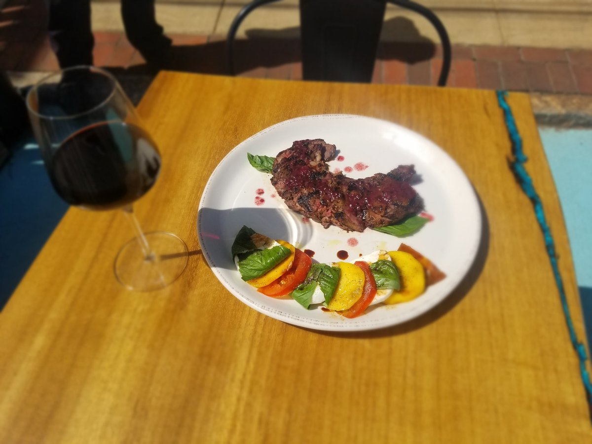 TheyStoleFromUs's tweet photo. Ribeye with blackberry wine butter sauce and a summer caprese salad with fresh peaches.  My entree special this week. https://t.co/FQ9LzaSXEI