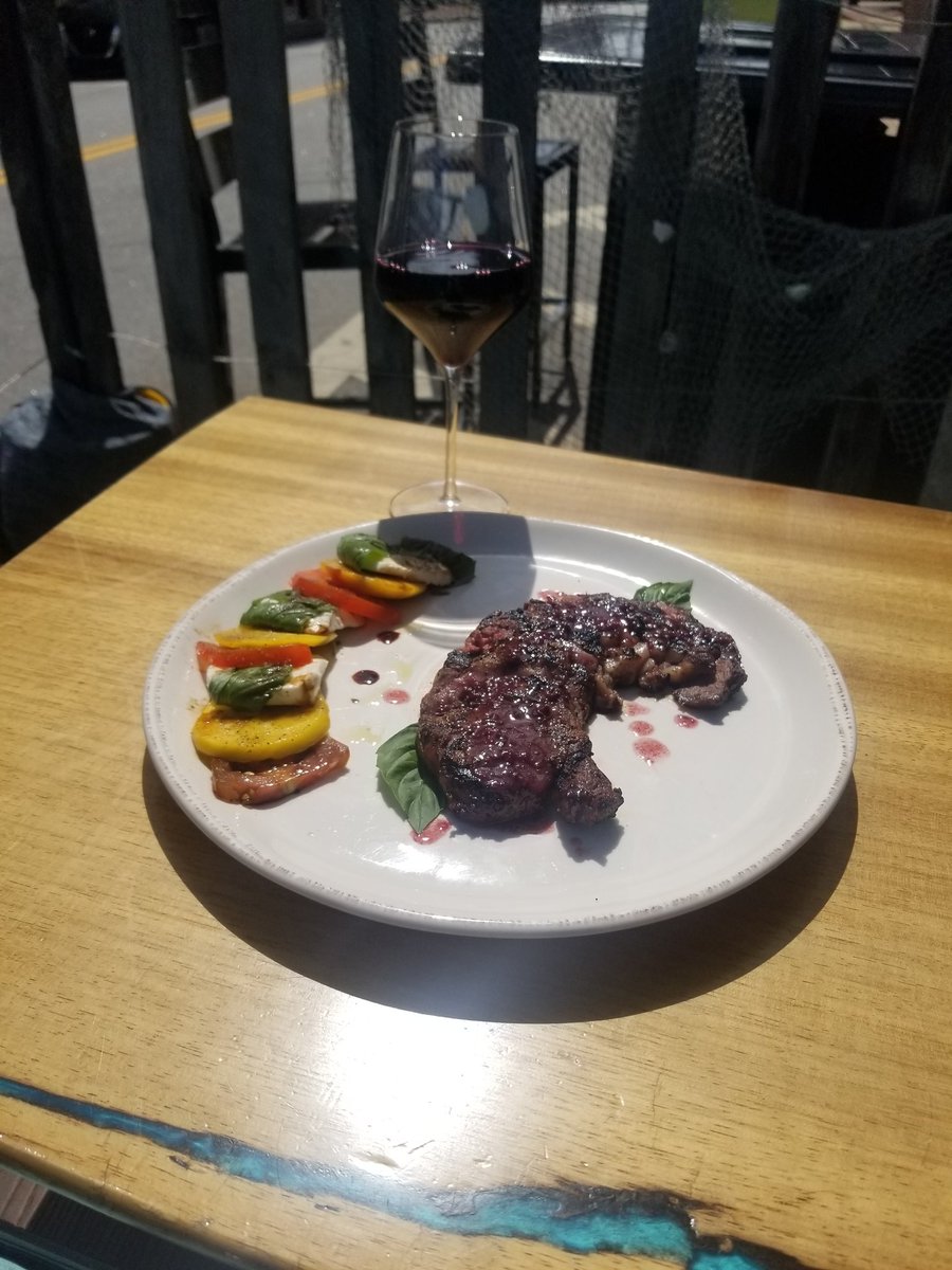 TheyStoleFromUs's tweet photo. Ribeye with blackberry wine butter sauce and a summer caprese salad with fresh peaches.  My entree special this week. https://t.co/FQ9LzaSXEI