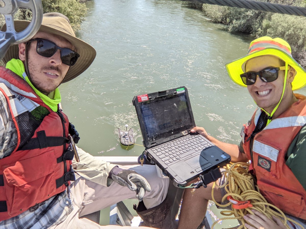 USGS_Nevada's tweet photo. Hydrographer Redinger instructing Hydrographer Rogaczewski on obtaining an ADCP streamflow measurement from the cableway today at 10312150 #CarsonRiver BLW #LahontanReservoir near Fallon https://t.co/TiiyJIcgGO https://t.co/AgV1XutRYb