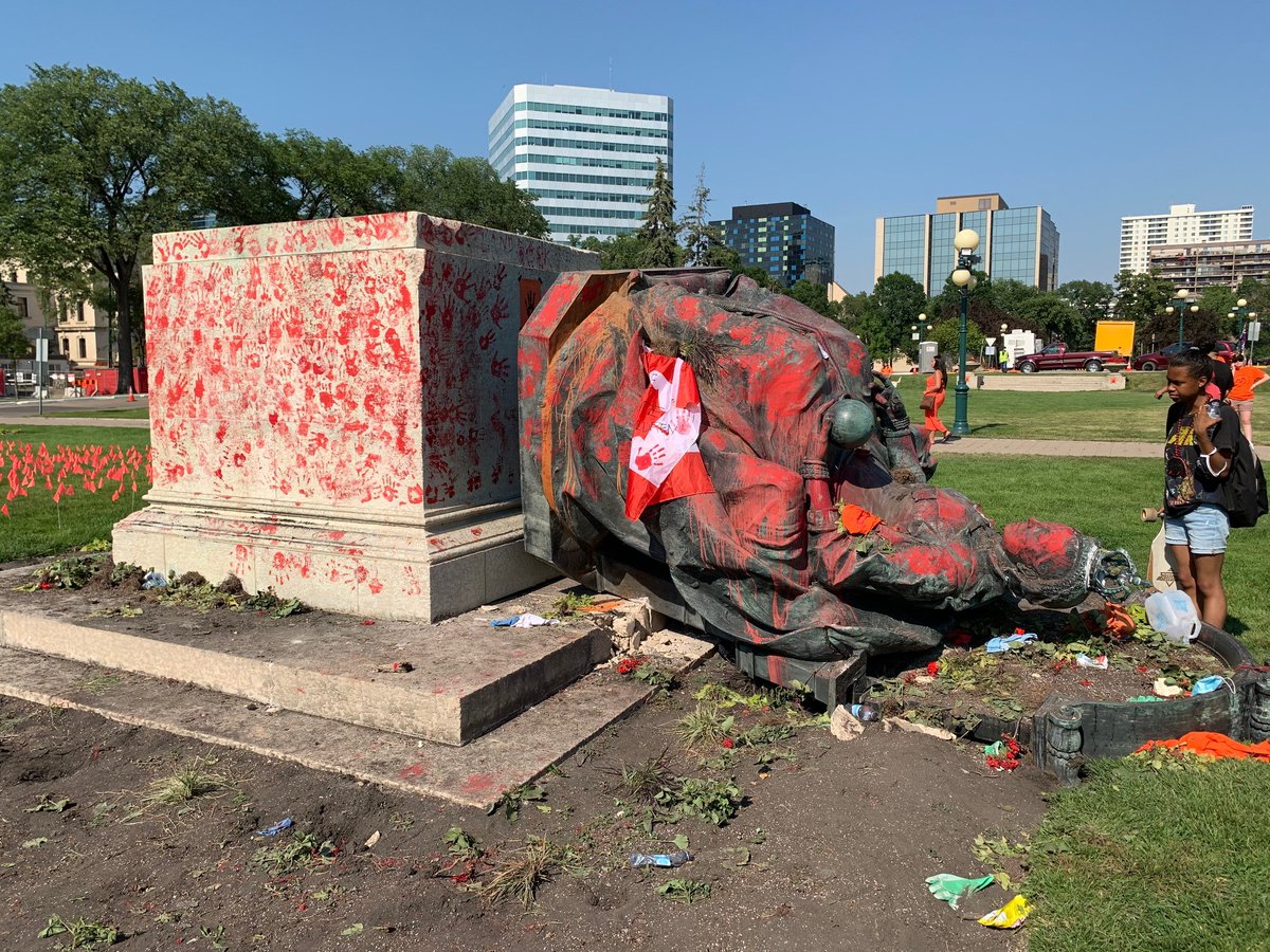BREAKING: Statue of Queen Victoria covered in red paint, toppled at Manitoba Legislative Building.