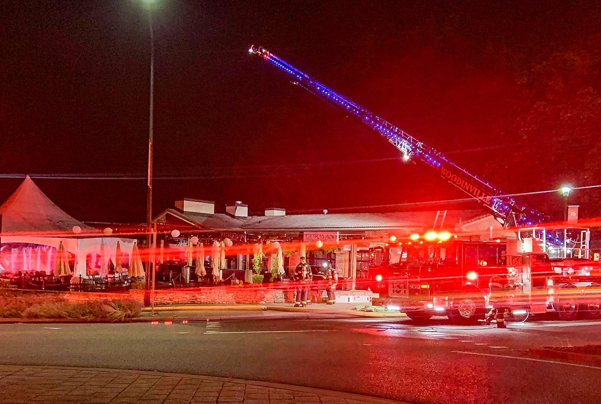WoodinvilleFire's tweet photo. Crews have extinguished the commercial fire located at the 14500 block of 148th Ave NE. Currently checking for extension and performing salvage and overhaul. Thank you to Redmond and Kirkland crews for their assistance. https://t.co/cnbpJwE7JC