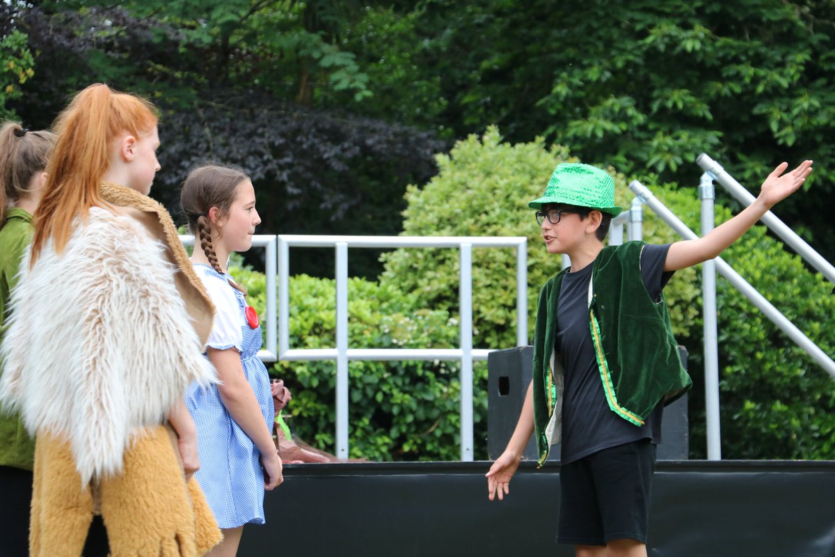 BCS_Senior's tweet photo. What a brilliant week of open-air shows! 🎭 Our first treat was Twisted Tales performed by #Year7 who worked so hard to create their own unique renditions of Little Red Riding Hood, Three Little Pigs, and the Wizard of Oz! 🐺🧙‍♂️🐷 @BCSDrama #showmustgoon @Bournemouthecho https://t.co/w0YkGABu7Q