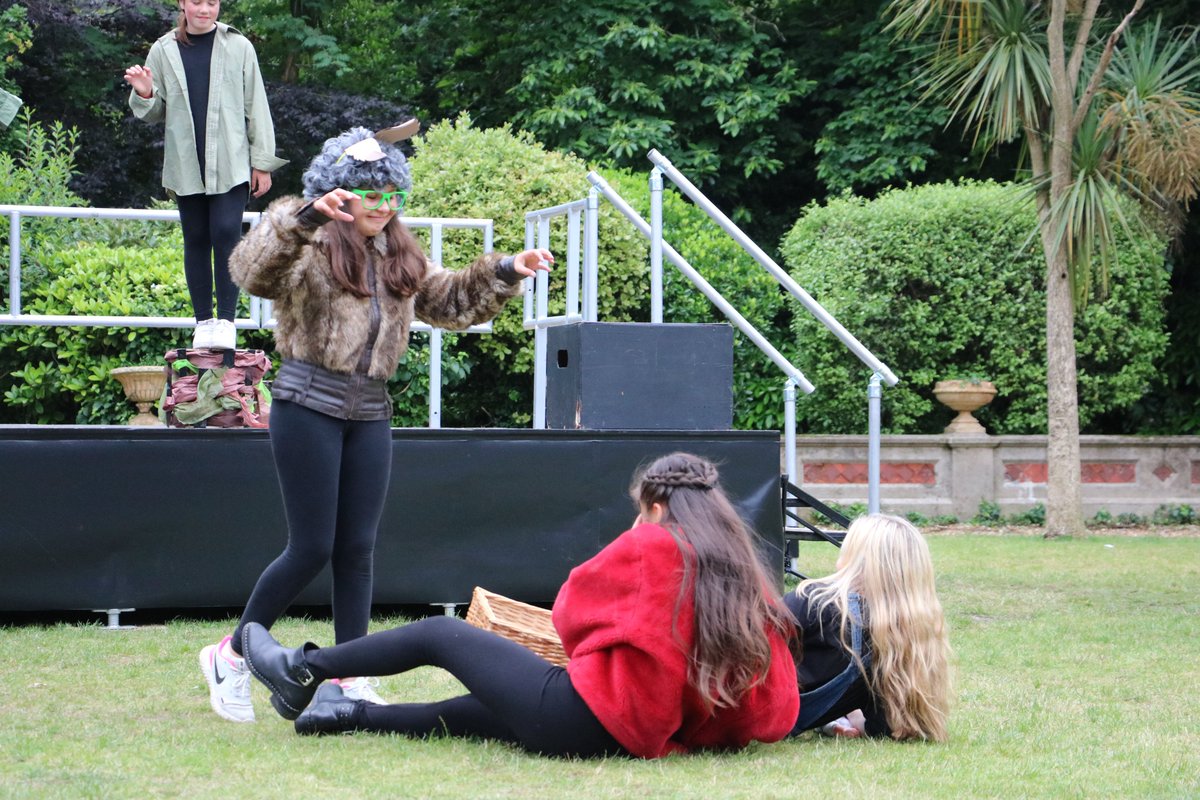 BCS_Senior's tweet photo. What a brilliant week of open-air shows! 🎭 Our first treat was Twisted Tales performed by #Year7 who worked so hard to create their own unique renditions of Little Red Riding Hood, Three Little Pigs, and the Wizard of Oz! 🐺🧙‍♂️🐷 @BCSDrama #showmustgoon @Bournemouthecho https://t.co/w0YkGABu7Q