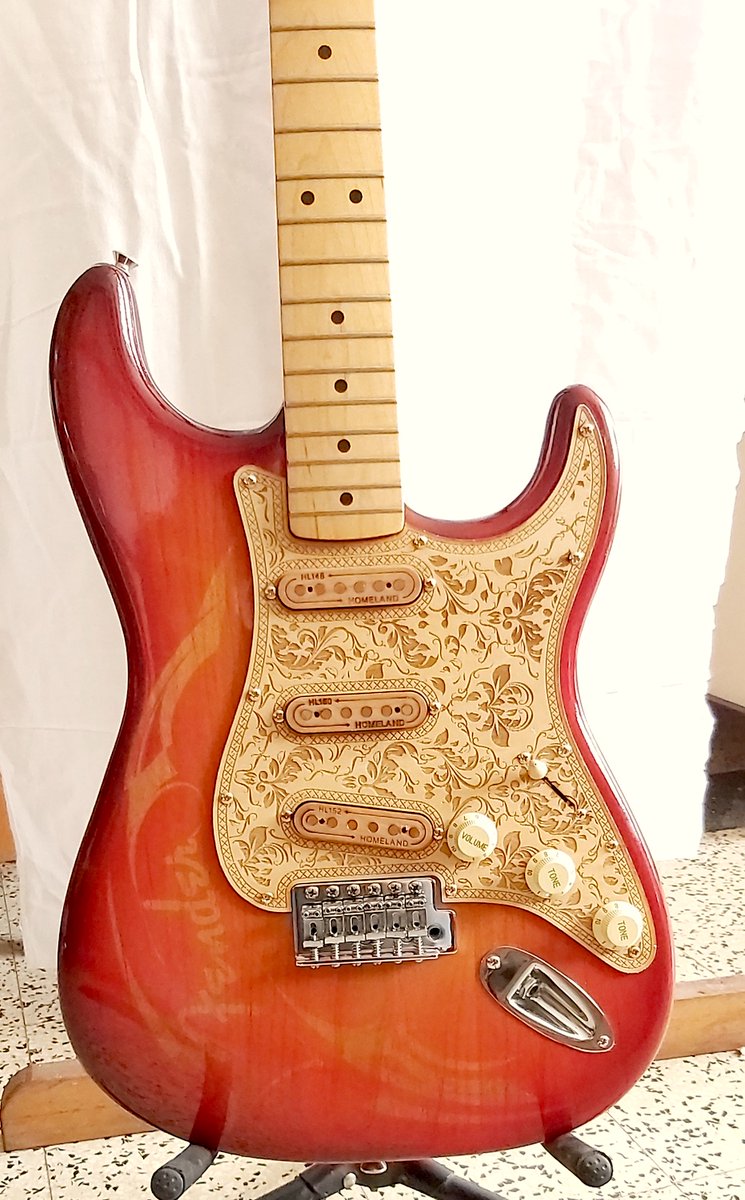 ArtraCustom's tweet photo. ArtrAcUstom style, Fender Stratocaster special country - US body, transparent paint with transparency patterns to clearly distinguish the grain of the wood, special Tex-Mex pickups  laser engraved pickguard and backplate, 5 coats of polyurethane varnish made by Daniel Trammer ® https://t.co/Je2uzTGKy6
