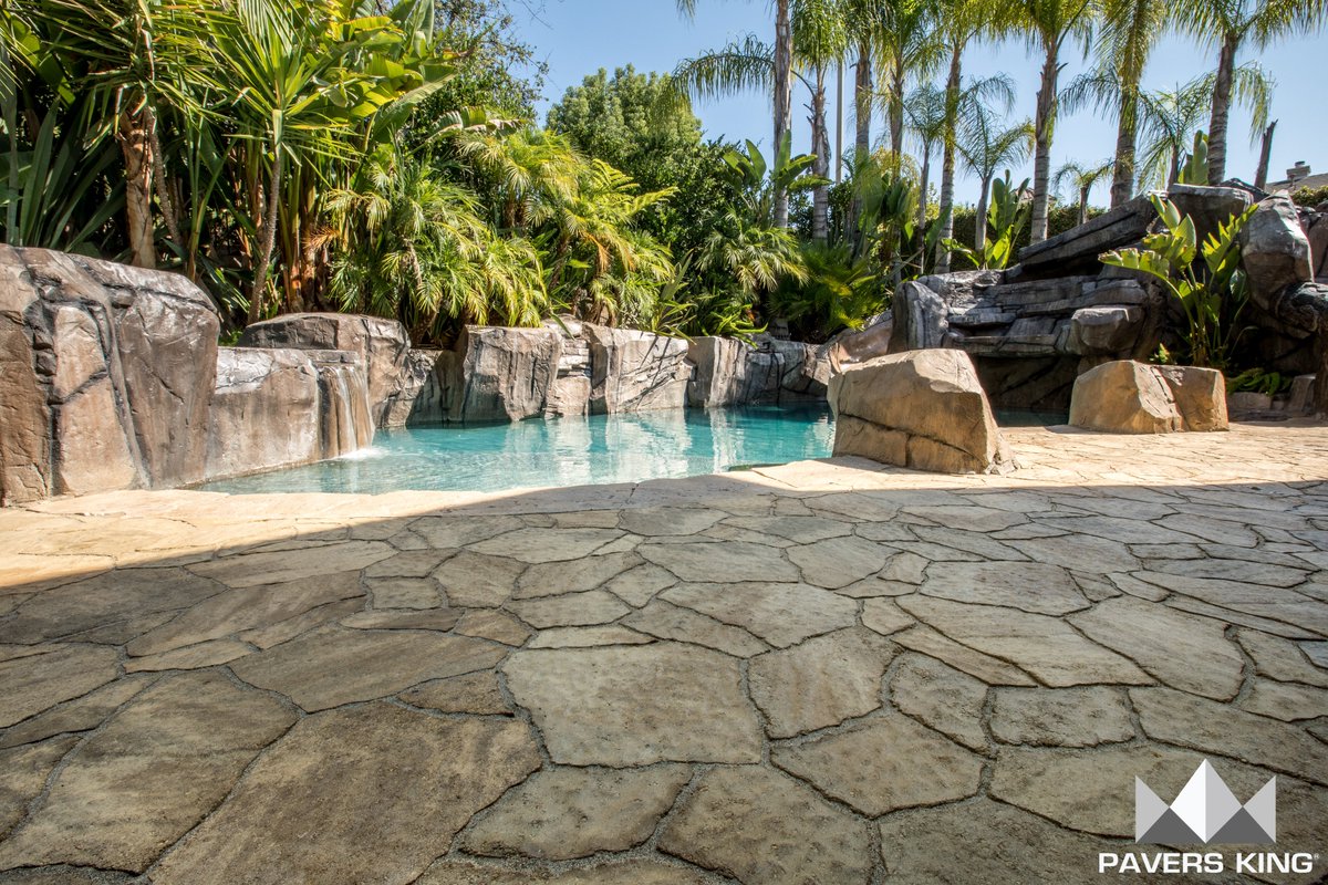 paversking's tweet photo. Vacation vibes with this Grotto-Style Pool Deck  🏝️ https://t.co/R5bJVtz76M