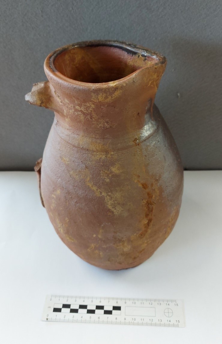 TPArchaeology's tweet photo. #FindsFriday this week is an almost complete jug, found in a well in Warwickshire. This is a Midland Purple jug, dated to the 15th – 16th century #Archaeology #BritishArchaeology https://t.co/ZvaAVkU5kf