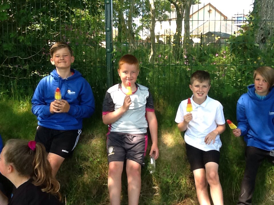 Cooling off with an ice lolly after all their sports day efforts!