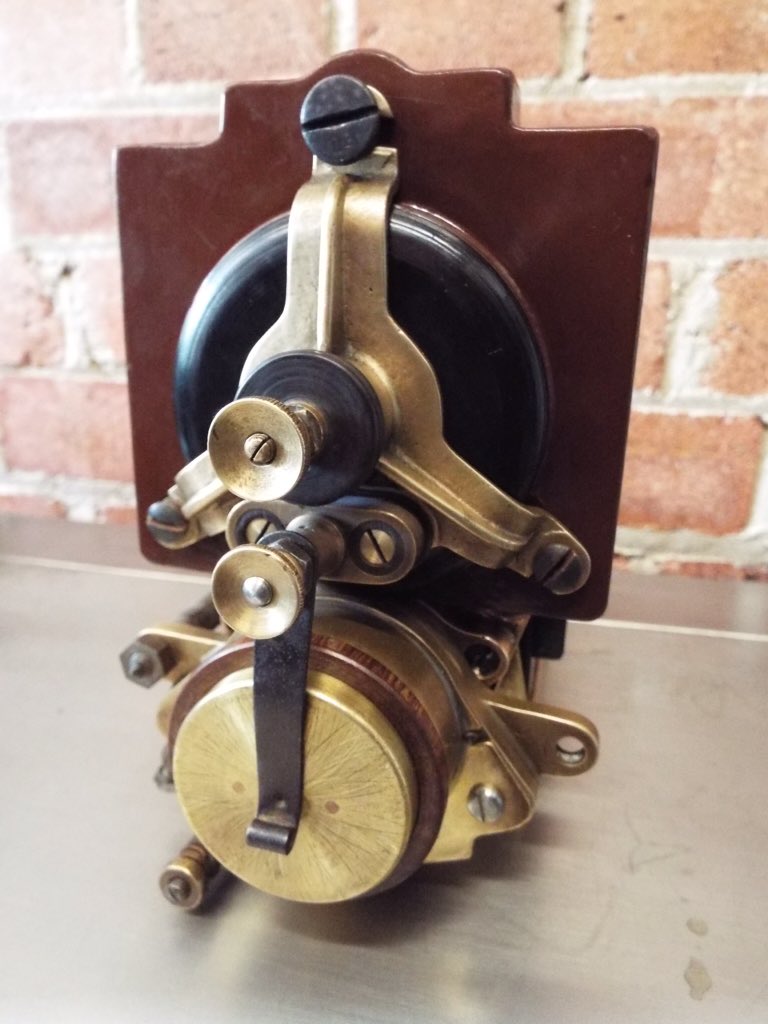 Turning a reclaimed piece of marine Tufnol into a Bosch DR4 points cap insulator. The magneto dates to 1911.