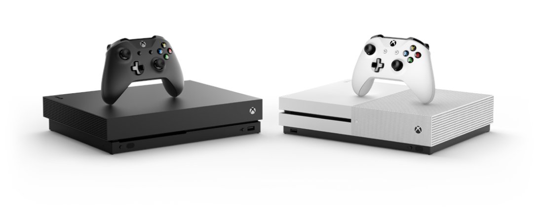 Image: Models of the black Xbox One X & a black Xbox One controller and the white Xbox One S & a white Xbox One controller