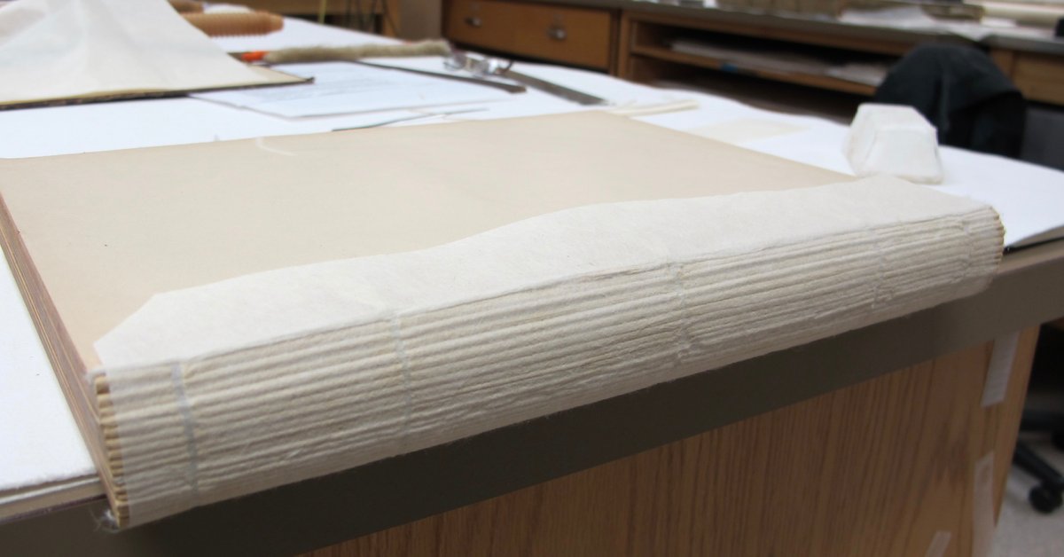 Did you know that the individual sections of pages in a book are also known as “signatures”? Here you can see the signatures of a book as it was being repaired by conservators. #ArchivesSignatures

 #ArchivesHashtagParty