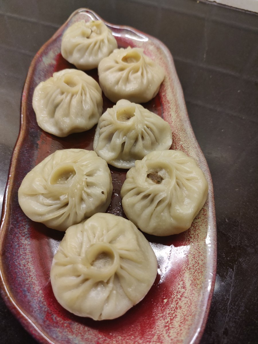 Shibanibawa's tweet photo. I am happy to share that I tried the newly launched #Momogogo. The steamed pork momos are as authentic as they get, and they have some fun fusion fare like bacon wrapped chicken momos, butter garlic momos and even a cheesy momo burger. Great stuff @BinitaChamling #momos https://t.co/eS9NFIrDUK