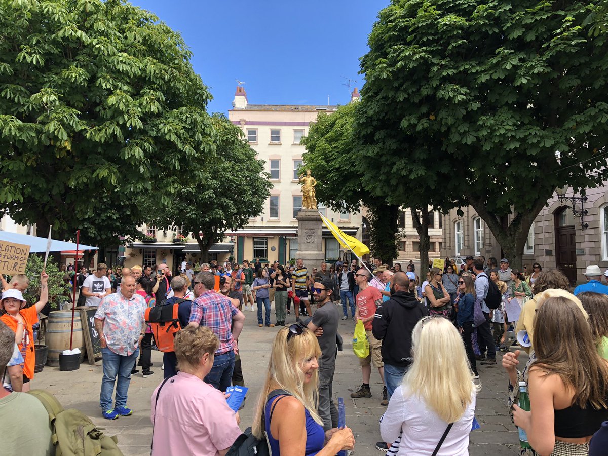 ClareBurtonTV's tweet photo. Around 80-90 people attending a rally in Jersey against Covid restrictions. They are calling for an end to testing and isolating of ‘healthy people’. The government says its contact tracing system keeps the Delta variant at bay until more are vaccinated. https://t.co/Mp77kiewW3