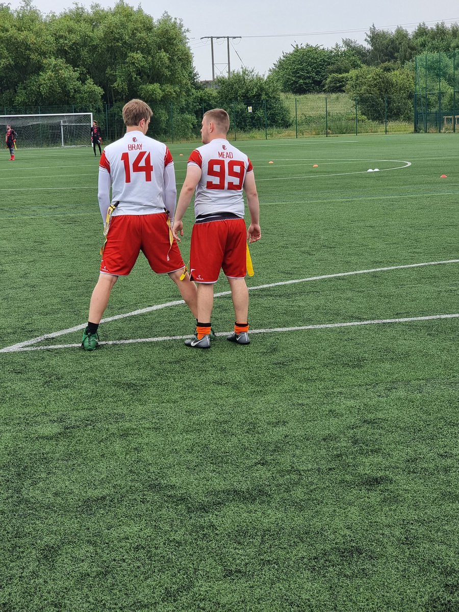 QB1 and Centre discuss tactics during our warm ups #Roosters