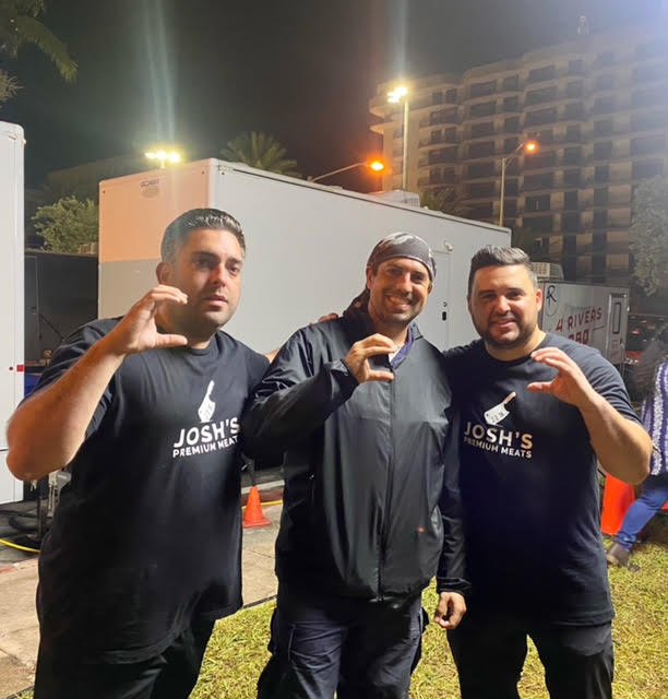 ColumbusHS_Mia's tweet photo. Josh Pascual '05 and Adrian Ferenadez-Romani '05 of Josh's Premium Meats served warm meals to first responders working day and night at the Surfside condo collapse site. The duo even reconnected with one of their first responder classmates, Jorge Cruz '05. #CPride #Adelante https://t.co/le7ZN471K2