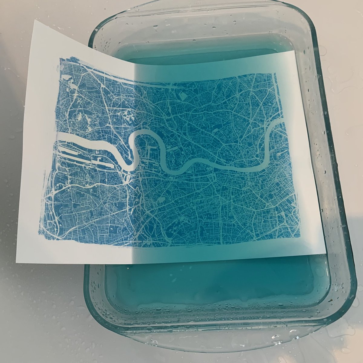 steveattewell's tweet image. 1/ Created this print today using the #cyanotype “sun print” technique. The negative was created with free @OrdnanceSurvey Open Zoomstack data. I’ve had soooo much fun mucking around with chemicals today 👍🏻 #osdeveloper