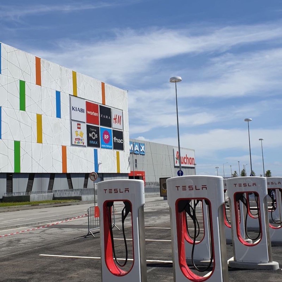 New Tesla superchargers installed at #Marshopping with our Masterpiece Omniflow (Smart IOT Lampposts) in the background. #IOT #SustainableSolution #SmartCities #Sustainability #co2neutral #co2reduction #5G #VAS #DigitalServices #Renewable #renewableenergy #Tesla #teslachargers