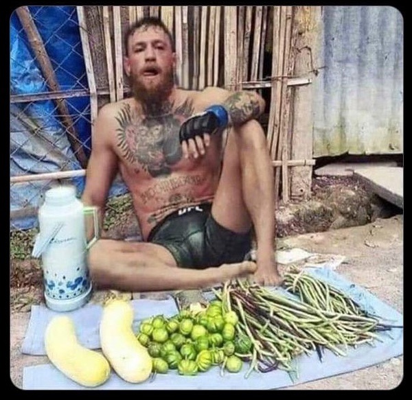 McIssy's tweet photo. @ThenotoriousMma Your leg is broke and ya whiskey is a joke! No worries, we got you a new side hustle Congrats @Dustinpoirier 🎉 #ufc264 https://t.co/mAleBkfJgq