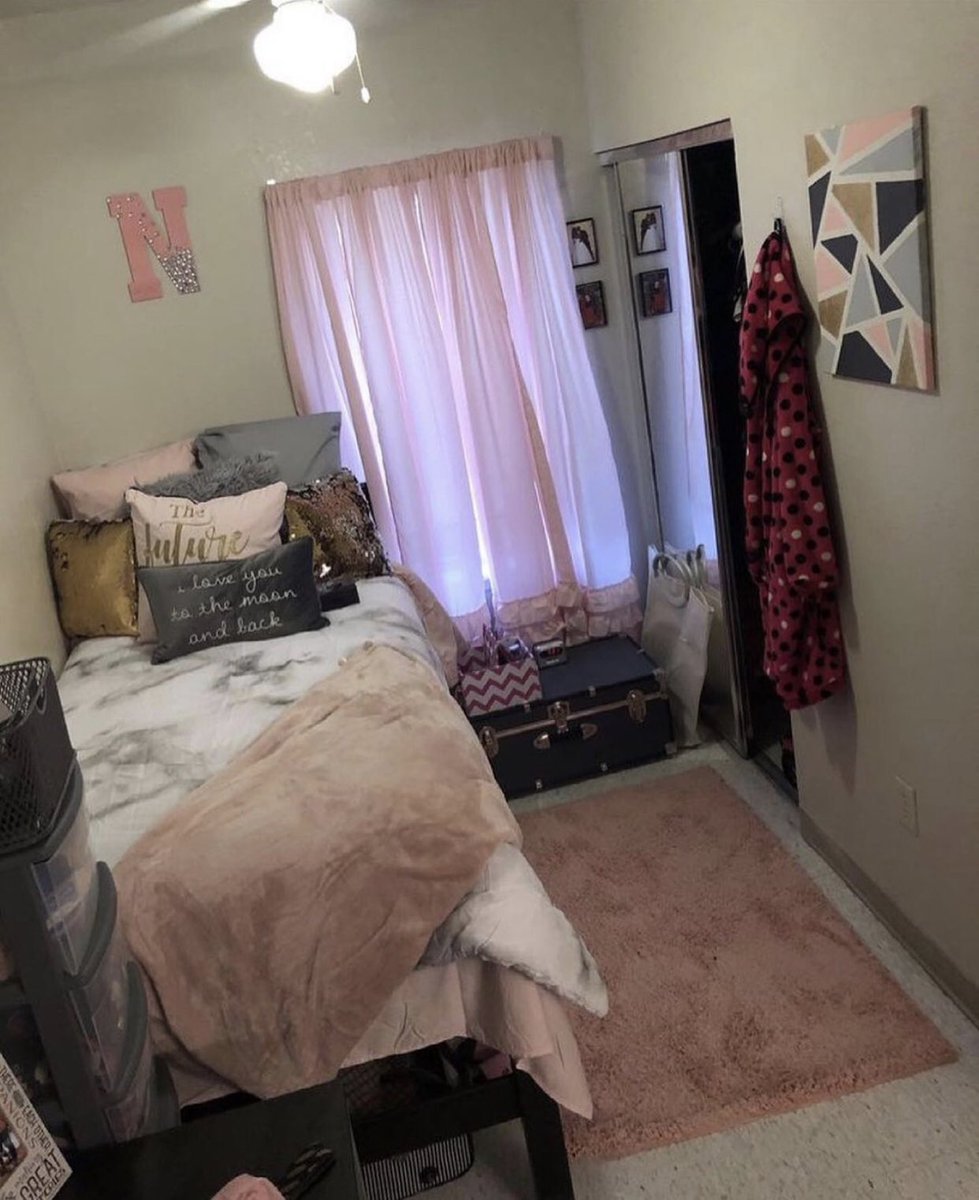 KamoraMiah's tweet photo. so we get back to the dorm and we got bored and started decorating our rooms but it’s like our rooms are separate and across from eachother and we have a small living room so her room is like *pic1* and mines is like *pic2* https://t.co/BcJSBztdGH