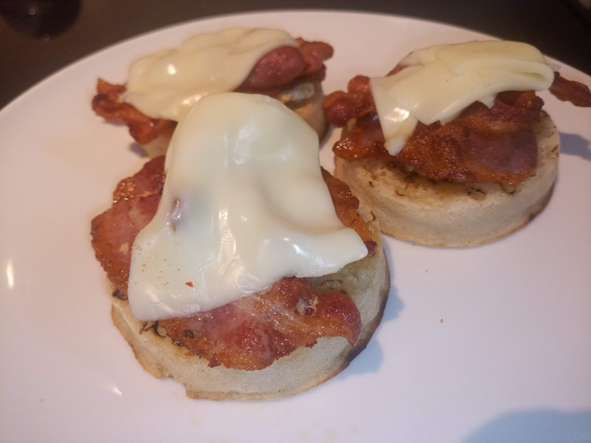 StuManx's tweet photo. Posh bacon and egg. On crumpets and with a melted slice of plastic cheese. Some famous TV chef will steal the idea. https://t.co/gvPCbIeKUj
