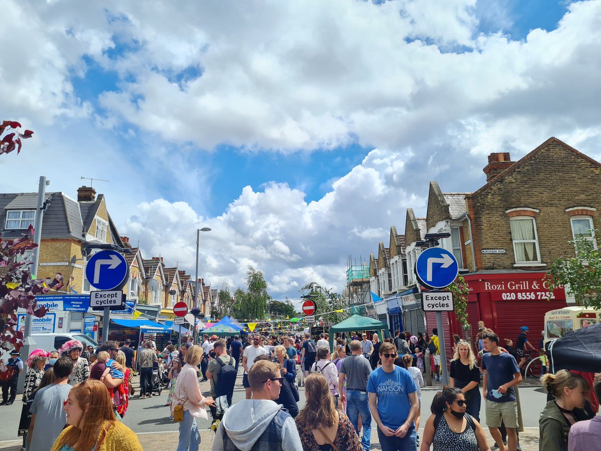 Plaistovian's tweet photo. This is Francis Road in Leyton, where before cars were given parking spaces and priority vs now that gave that space to people. 

Want to revitalise communities and support businesses? Open up space for the public! https://t.co/ux3dec806M