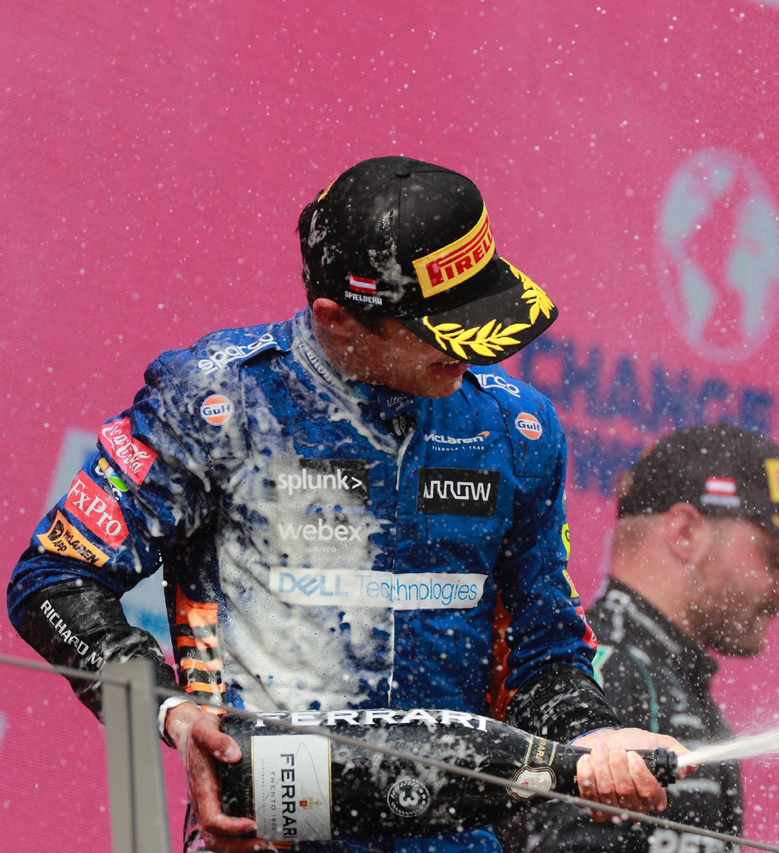 McLarenF1's tweet photo. Take it in, @LandoNorris! 🧡

Enjoy the moment. 🍾☔️

#AustrianGP 🇦🇹 https://t.co/xo8YgFJh4k