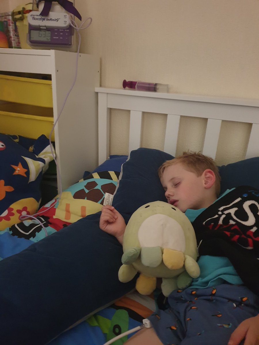author_wells's tweet photo. 'Button' change day for Teddy. This is the feeding tube which goes directly into his tummy. He always finds having a new button placed stressful, but today we used all the techniques Little Crab has taught us. It worked! Now a happy Teddy, fast asleep 💤🦀🌊🥰 https://t.co/Qz4H6Qu91l