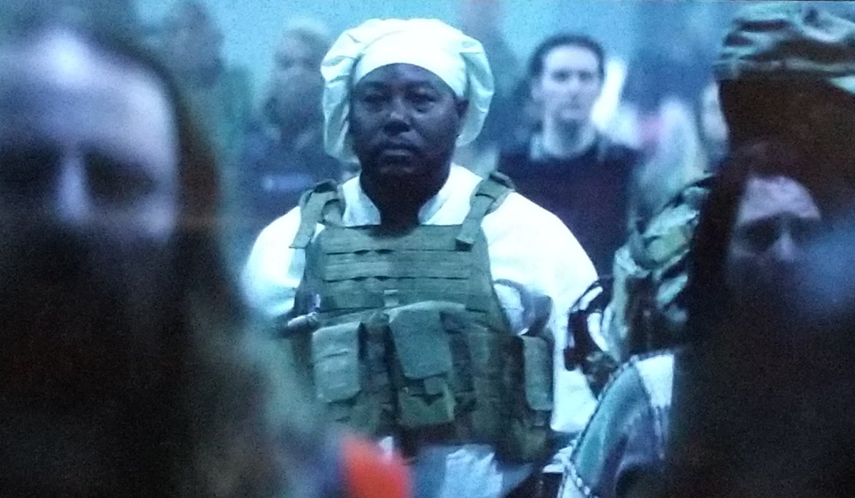 lharrisonwest's tweet photo. I have a lot of questions after watching #TomorrowWar but the biggest question I have is why is no one talking about this guy? Do they need cooks in the future war? Is he some kind of conscientious objector? Did he not have time to change? So confused. https://t.co/uFxxJY3Ukg