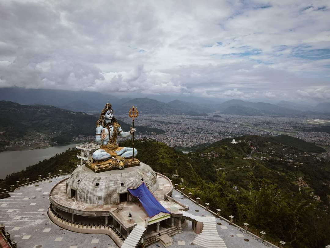 RONBupdates's tweet photo. Monday Morning and Statue of Lord Shiva along with Fewa lake &amp; Pokhara City in background. ❤️🙏

Pic. Prakash Poudel https://t.co/Ys7jUniVeE