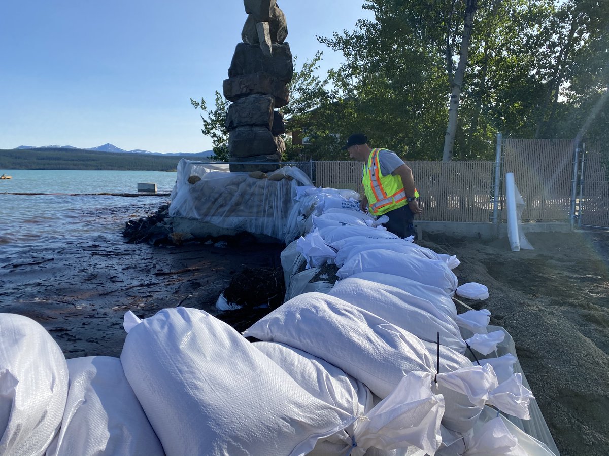 With water levels continuing to rise in Yukon, responders are working hard to protect access roads and residences. 

More than 200,000 sandbags and 1,000 super bags have now been deployed to the Southern Lakes area, including Lake Laberge.
