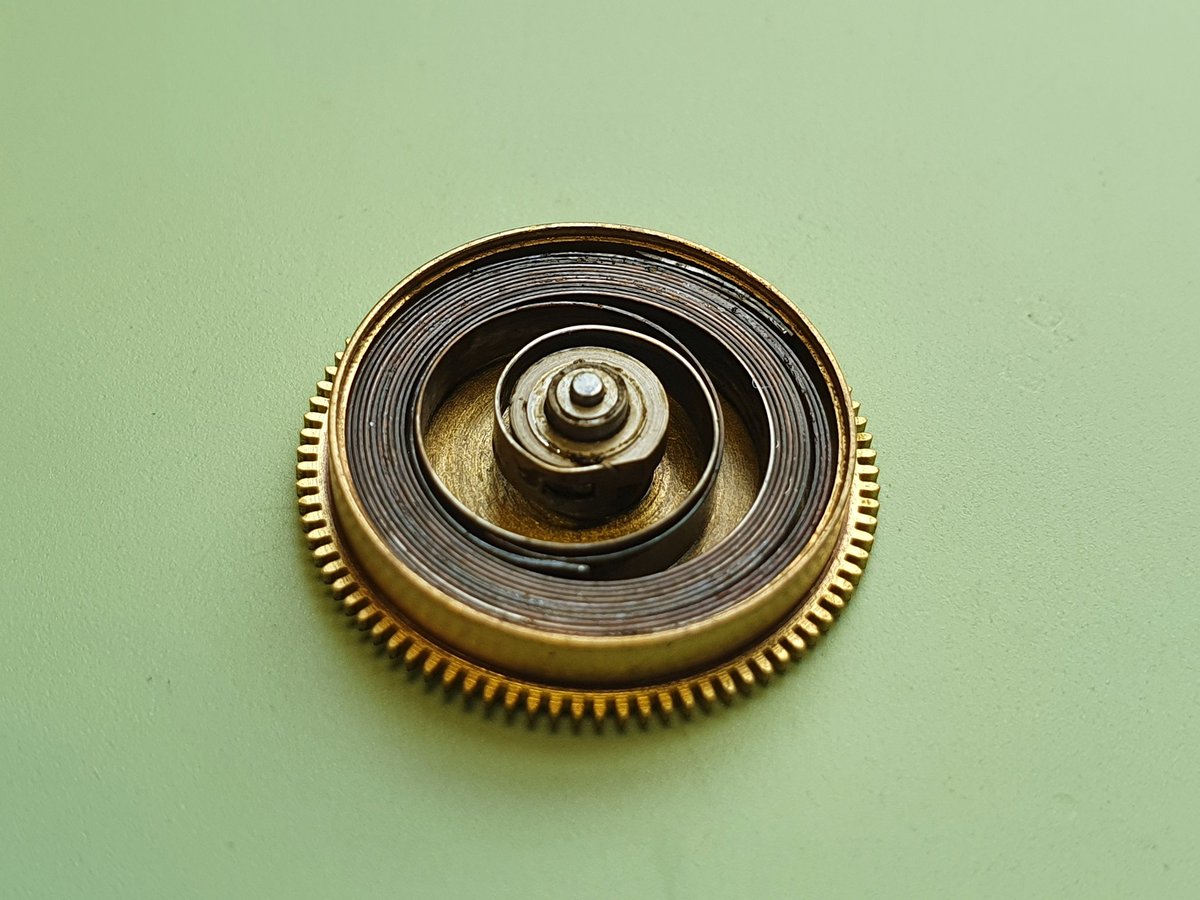 The_Clockmaker_'s tweet photo. Today I came across a very primitive repair on an old military issue pocket watch. There's no telling where this repair took place however it may have been the work of a field watchmaker during times of conflict. As shown, the spring has been riveted together to function again! https://t.co/IGjHiW29bx