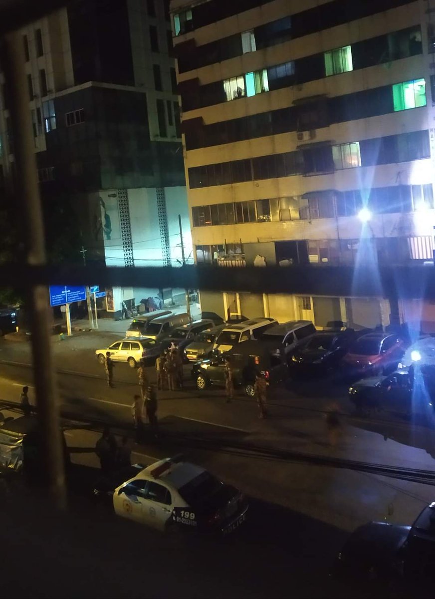 Wint2205's tweet photo. #MyanmarMilitaryTerrorists invaded into Anaw-Rahta Rd, Yangon's Sule Tsp at around 10:08 PM tonight. Junta's informant brought Terrorists there.  LEGALIZE NUG #July5Coup  #WhatsHappeningInMyanmar https://t.co/Mpdyi9msn2