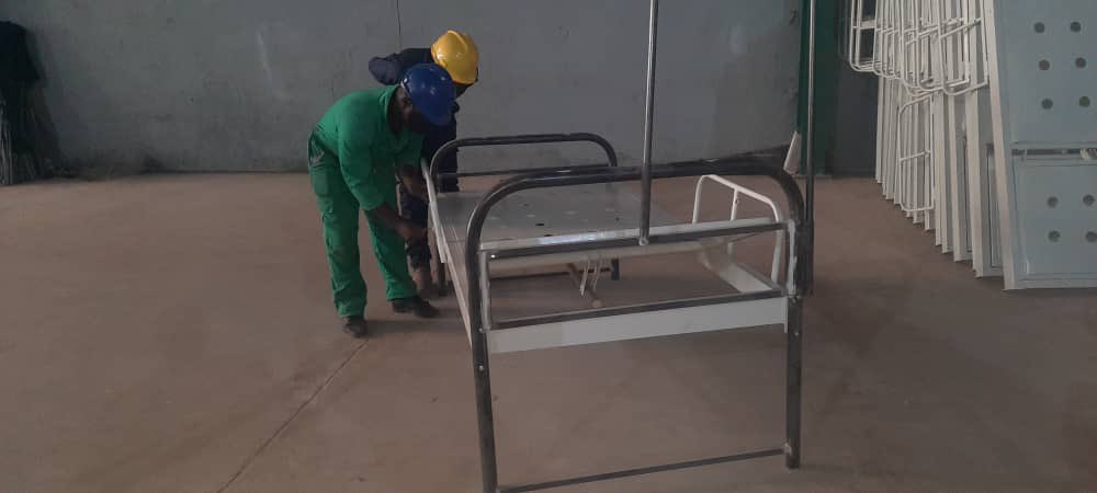 MinofHealthUG's tweet photo. Over 5,000 patient beds will be deployed to Regional Referral Hospitals to support the ongoing COVID-19 response. Earlier today, the Commissioner in charge of Health Infrastructure, Eng. George Otim inspected the ongoing works at Fabrication Systems and Atami Agencies Ltd. https://t.co/FiAtYm2mXe
