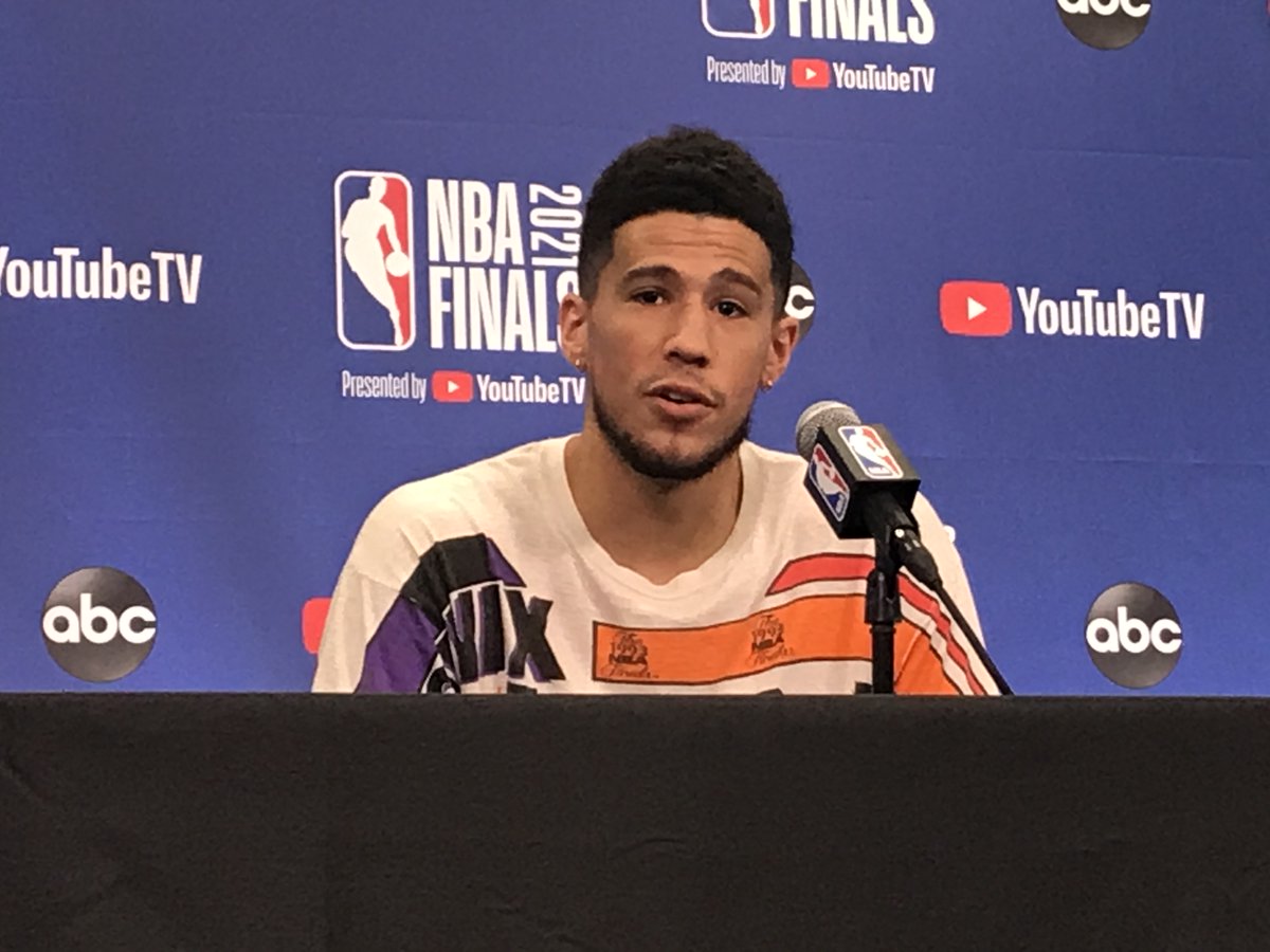 DuaneRankin's tweet photo. Devin Booker is wearing #Suns 1993 #NBAFinals shirt. https://t.co/SsveWOqvfH