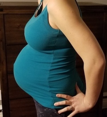 26 weeks. 

Movements galore between both babies. They respond to mom's touch and voice, and from other people's touch. 

Swelled ankles, several meals and snacks daily. Getting tired more frequently and hot days are murder on her. 

Can see toes, but not feet.

(@_sexysuperhero)