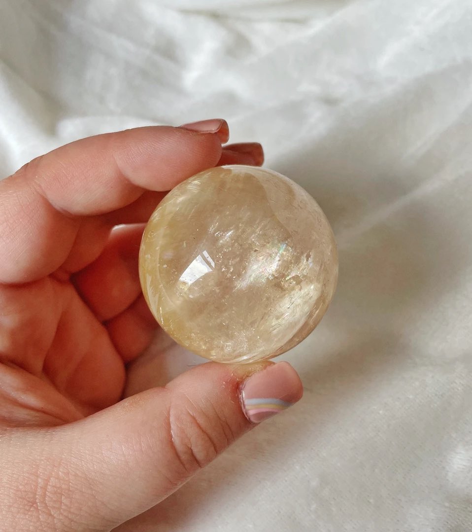whimsycrystals's tweet image. only 2 honey calcite spheres are left!!🍯✨